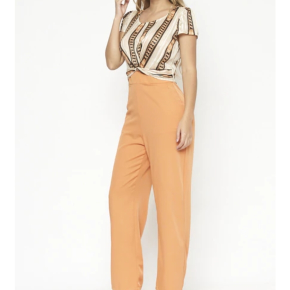 short orange jumpsuit